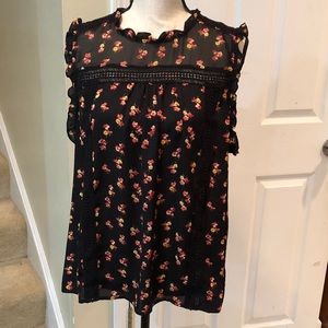 Beautiful, flowy, sleeveless blouse